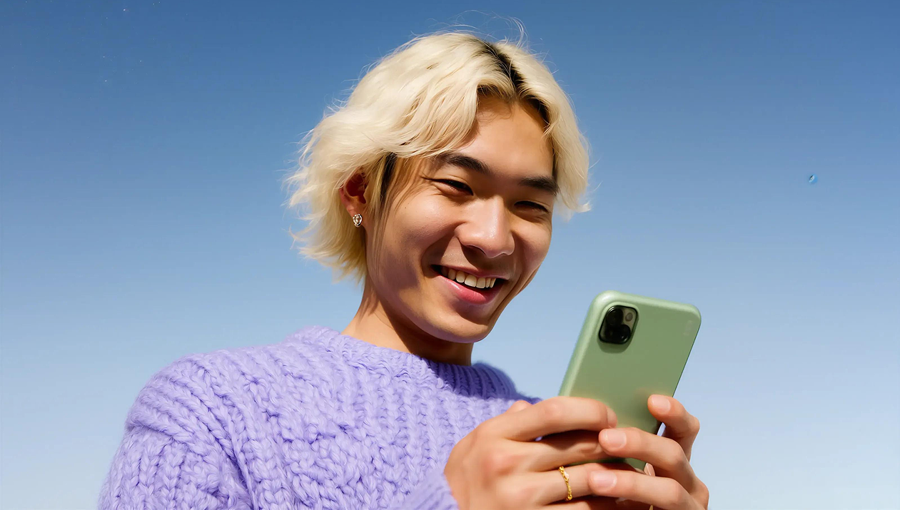 Creator in purple sweater