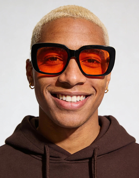 Creator in orange sunglasses